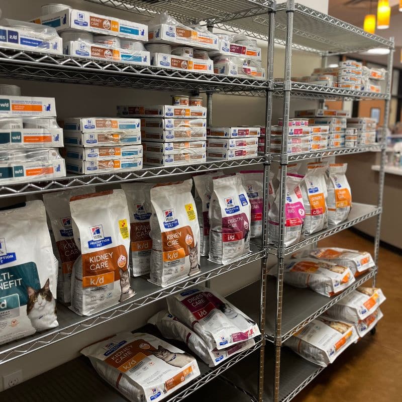A store shelf displaying various dog food